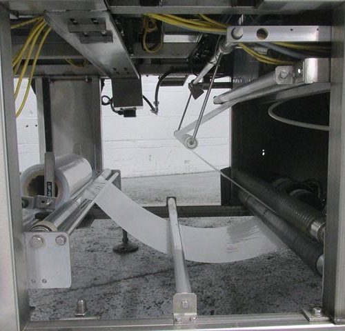 API Model DuraTech 2000SPH Single Lane 120 CPM Shrink Bundler with Heat Shrink Tunnel