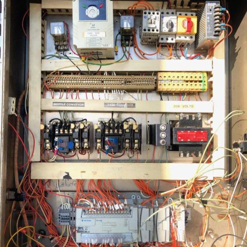 Hartness Model 825 20 CPM Drop Case Packer