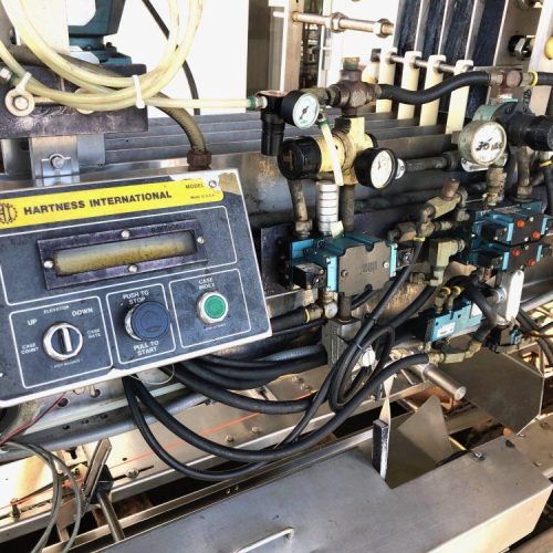 Hartness Model 825 20 CPM Drop Case Packer