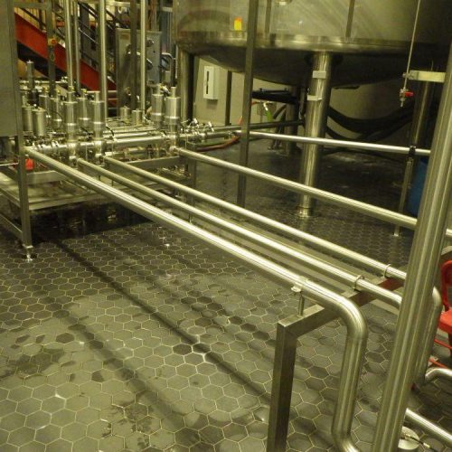 Finished Beer Processing and Distribution System w/ (2) 300 BBL Mueller Brite Tanks