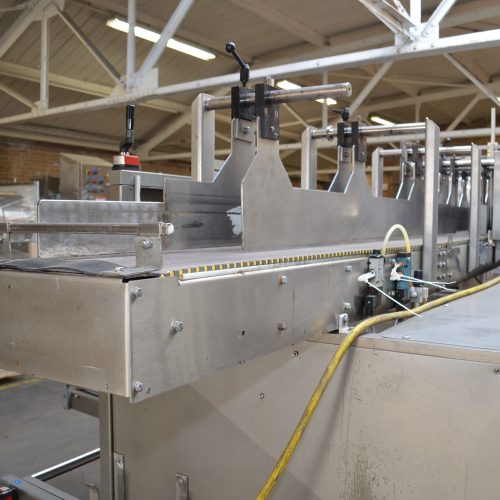 Combi Model 2EZHSDP High Speed 20 CPM Case Erector, Drop Packer, and Sealer