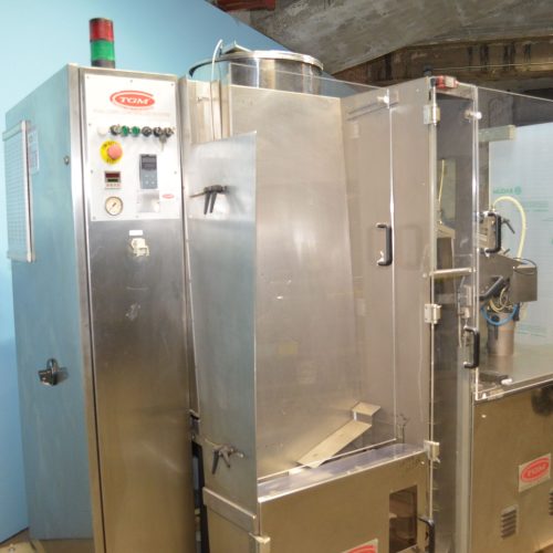 TGM Model B620AC 6,000 PPH Rotary Tube Filler and Fold and Roll/Hot Air Sealer