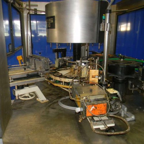 Krones Canmatic (12) Head Rotary Hot Melt Labeler