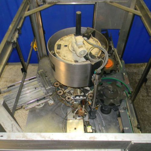 Krones Canmatic (12) Head Rotary Hot Melt Labeler