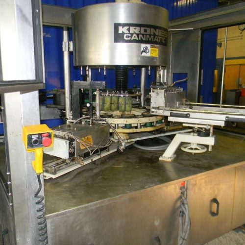 Krones Canmatic (12) Head Rotary Hot Melt Labeler