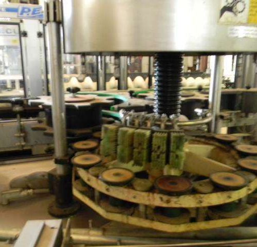 Krones Canmatic (12) Head Rotary Hot Melt Labeler