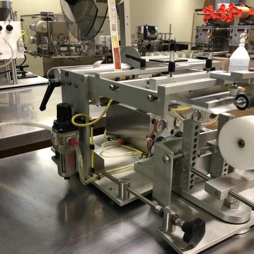 Universal Model R310FB Table Top Front and Back Labeler