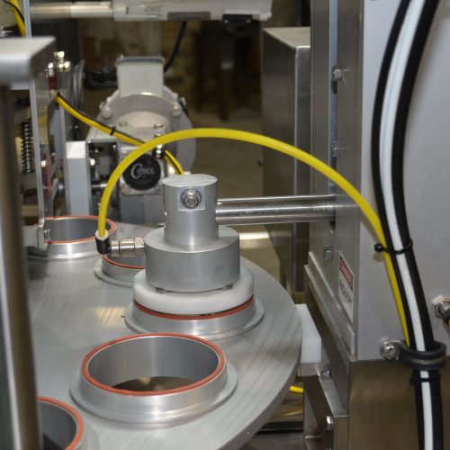 World Cup Model 1232 (12) Head S/S Rotary Cup Filler, Sealer, Overlidder