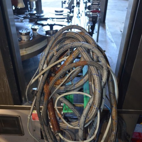 PE Model Rollmatic (18) Head Rotary Labeler