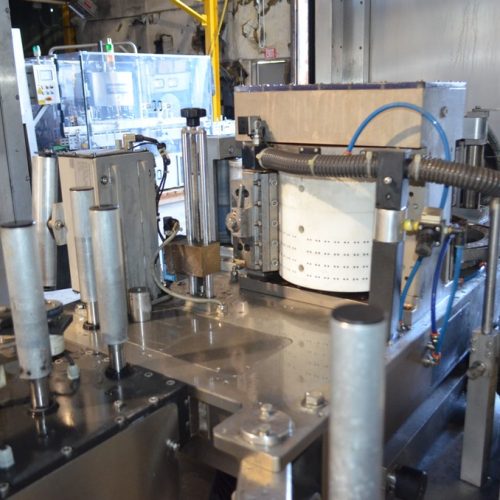 PE Model Rollmatic (18) Head Rotary Labeler