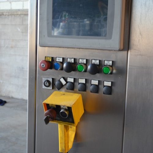 PE Model Rollmatic (18) Head Rotary Labeler