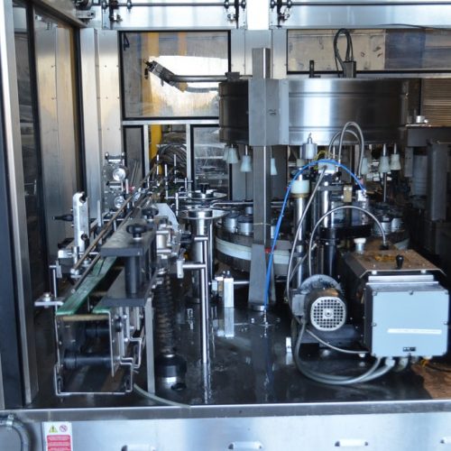 PE Model Rollmatic (18) Head Rotary Labeler