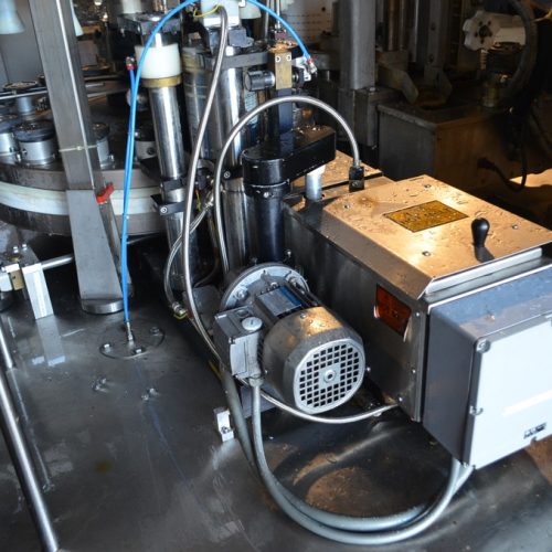 PE Model Rollmatic (18) Head Rotary Labeler