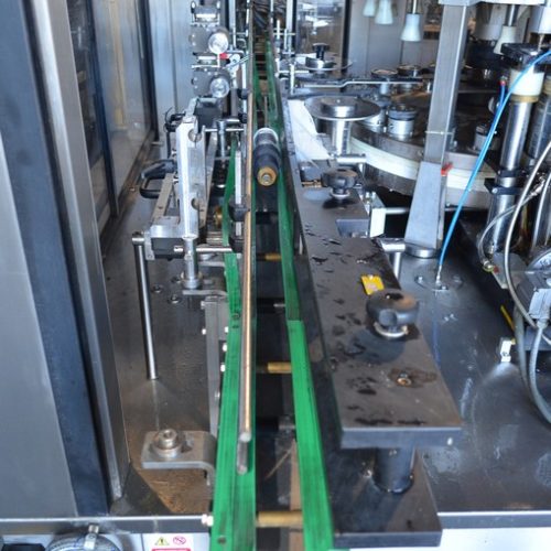 PE Model Rollmatic (18) Head Rotary Labeler