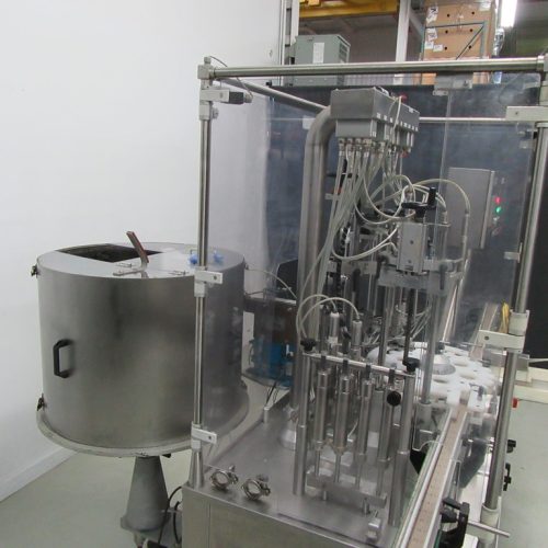 Capmatic Model Patriot FC0411 S/S Monoblock Filler and Pump Inserter