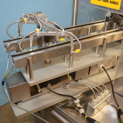 Capmatic Model Alpha C144 (10) Head Monoblock  Pump Placer Capper