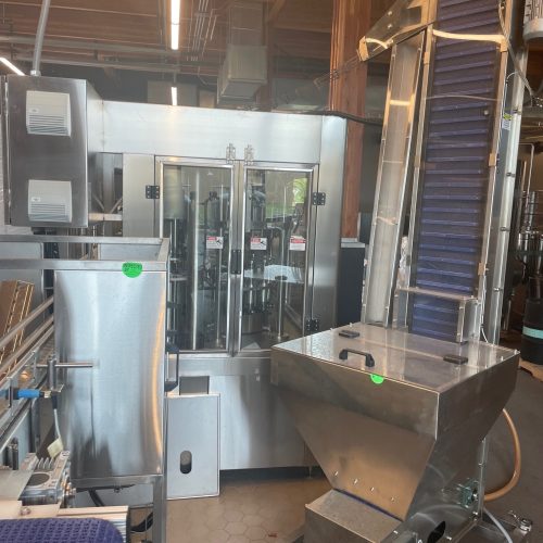 Norland Model GlassPak33 (12) Head Monoblock Rotary Bottle Filling Line with Capper