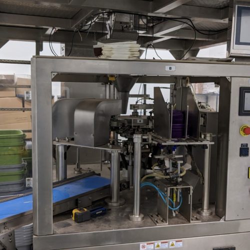 Excel Rotary Premade Pouch Filling and Sealing System with Pouch Filler, Combination Scale, and Bucket Elevator