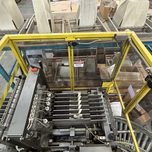 Climax Com-Pak Tandem Drop Case Packer with Lane Divider and Seven Sets of Change Parts25 CPM