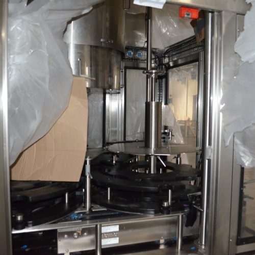 US Bottlers Model FM3078 / RC1026 Monoblock 200 BPM Rotary Filler and Capper with Cap Sorter