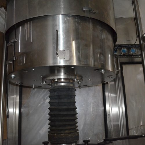 US Bottlers Model FM3078 / RC1026 Monoblock 200 BPM Rotary Filler and Capper with Cap Sorter