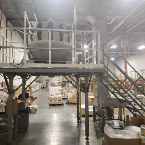 Fraser & Son. New platform constructed to incorporate Yamato Scales, Bartelt, stand-up pouch machine, and Fraser & Son bucket elevator