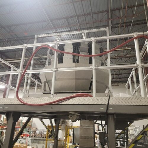 Fraser & Son. New platform constructed to incorporate Yamato Scales, Bartelt, stand-up pouch machine, and Fraser & Son bucket elevator