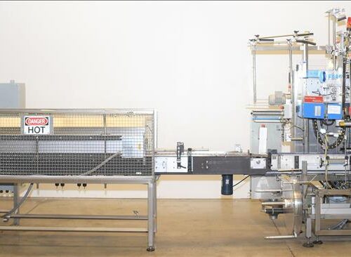 Accraply Model 650VF High Speed 650 CPM Shrink Sleeve Label Applicator with Heat Shrink Tunnel