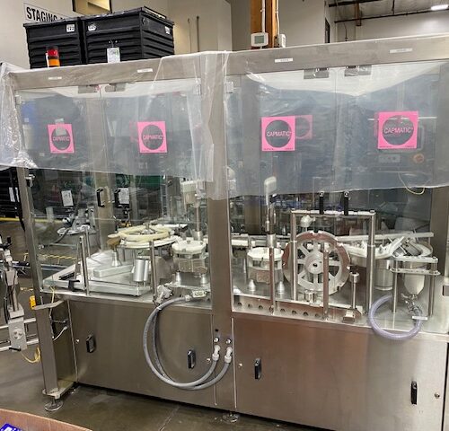 Capmatic Model BambinaFPCL Stainless Steel 40 BPM Monoblock Filler, Dropper/Plugger, and Labeler