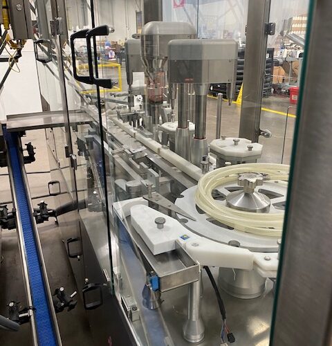 Capmatic Model BambinaFPCL Stainless Steel 40 BPM Monoblock Filler, Dropper/Plugger, and Labeler