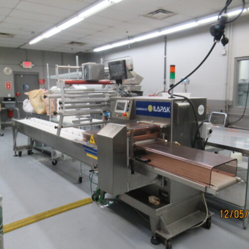 Ilapak Model Carrera500 Horizontal Flow Wrapping Machine with 10 Foot Lug Chain Infeed