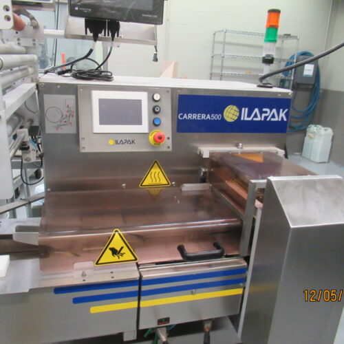 Ilapak Model Carrera500 Horizontal Flow Wrapping Machine with 10 Foot Lug Chain Infeed