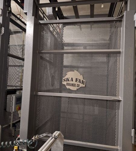 Ska Fab Depalletizer with Associated Conveyors