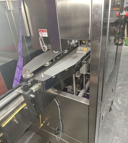 SleeveSeal Model SSL100 Stainless Steel High-Performance Vertical Sleeve Labeler