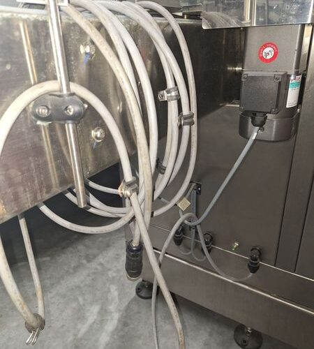 SleeveSeal Model SSL100 Stainless Steel High-Performance Vertical Sleeve Labeler