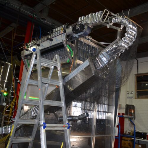 Alpha Brewing Operations Stainless Steel Can Depalletizer with Top Mounted Conveyor and Twisting Can Inverter and Can Risner