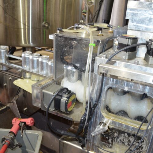 Alpha Brewing Operations (10) Head Stainless Steel Inline Can Filler with (2) Lane Lid Dispenser, Can Seamer, Water Rinse, Conveyor, Digital Touch Screen Controls