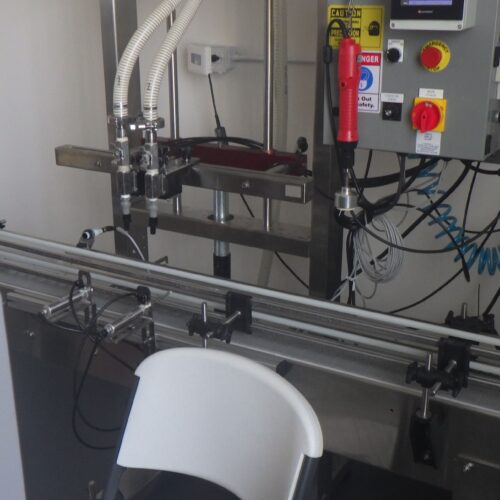 Chadam S/S (2) Head Inline Gravity Fed Filler with Manual Screw Capper and Digital HMI Controls