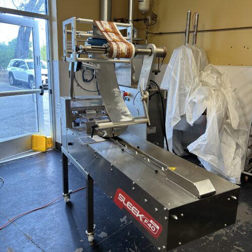 Weighpack Model SleekWrapper40 S/S Horizontal Flow Wrapper with Domino Model VX350i Thermal Transfer Coder