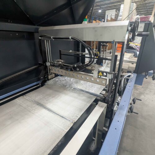 Conflex Model SYNC Continuous Motion Servo Side Seal Overwrapper