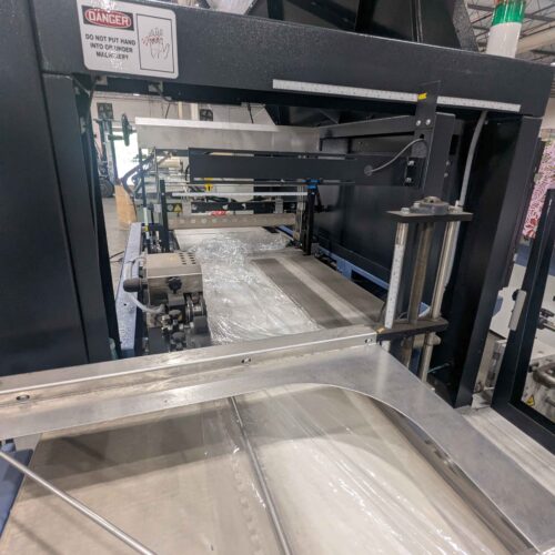 Conflex Model SYNC Continuous Motion Servo Side Seal Overwrapper